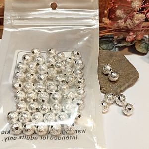 Set mit 50 Perlen Metallspacer Sternenstaub 8 mm silber